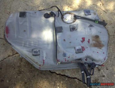 Unpainted tank with fittings